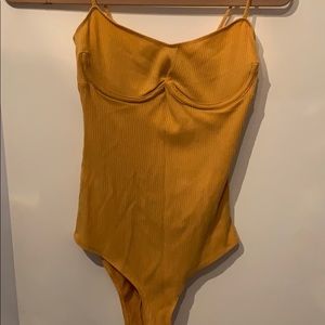 Yellow tee material body suit